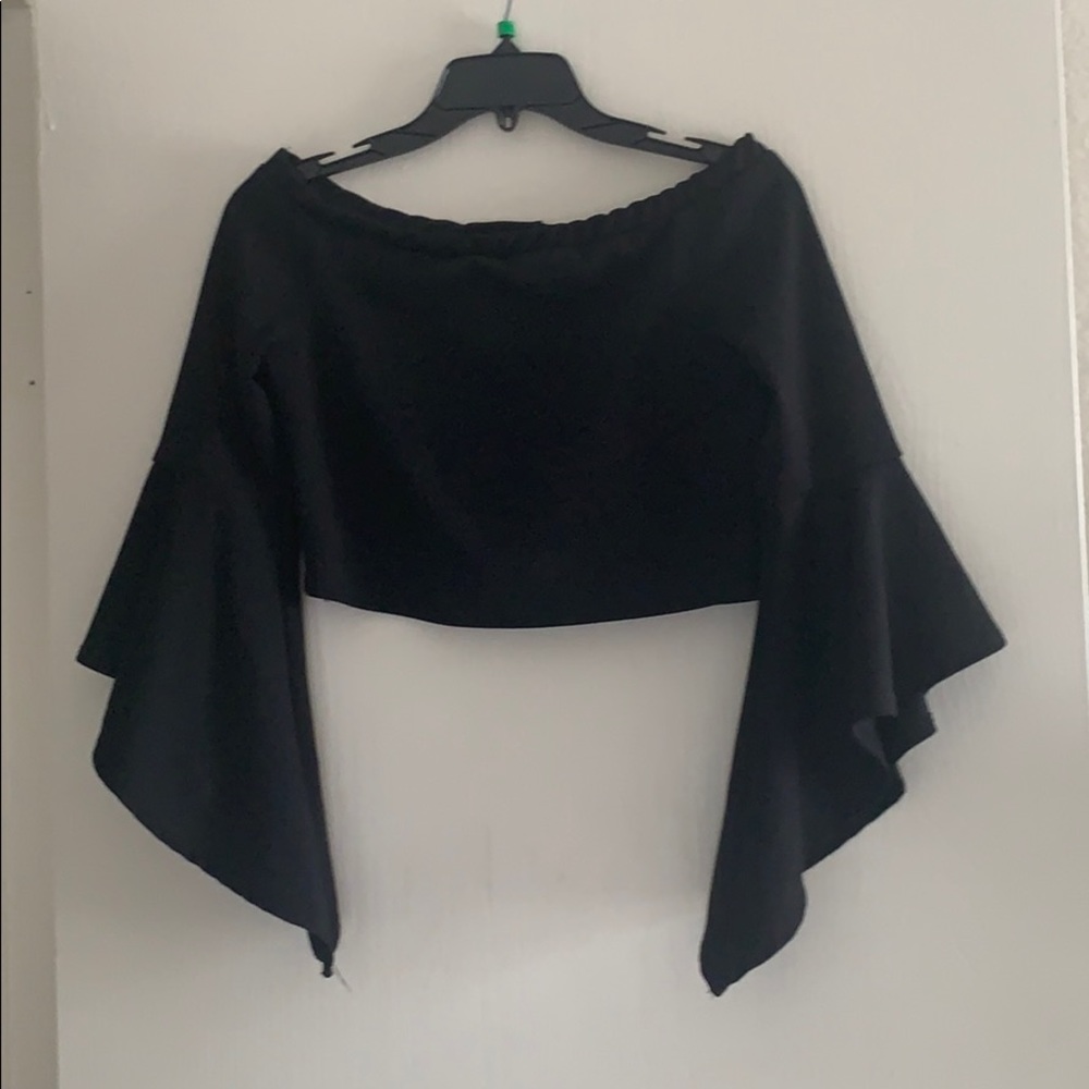 Black off the shoulder top with bell sleeves!
